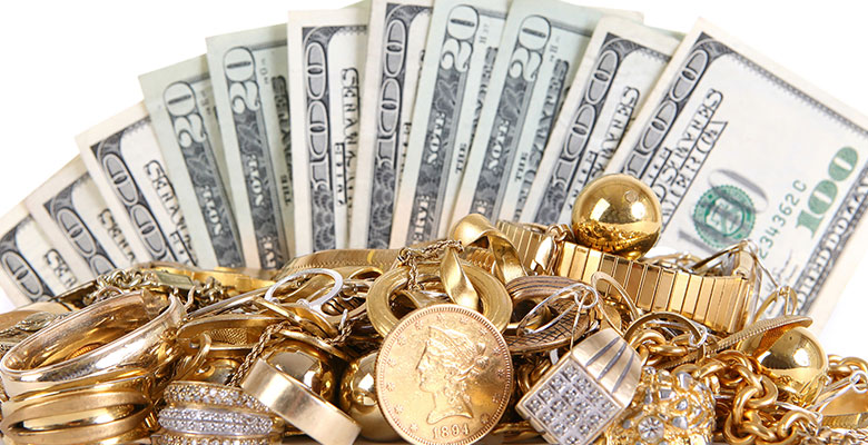 gold in front of cash